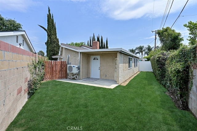 4781 Kona Kove Way, Yorba Linda, CA 92886 - back of property with a chimney, a fenced backyard, and stucco siding