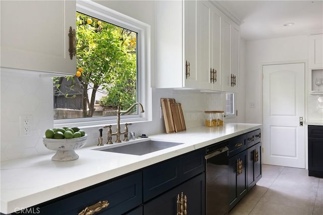 2982 Edgewick Rd, Glendale, CA 91206 - kitchen with dishwashing machine, white cabinets, decorative backsplash, and light countertops