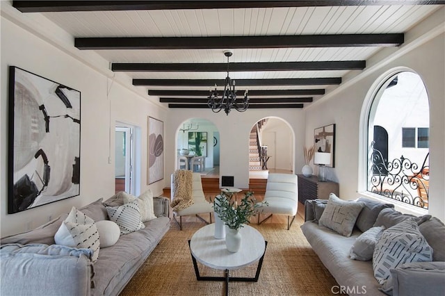 2982 Edgewick Rd, Glendale, CA 91206 - living room with arched walkways, beamed ceiling, and a chandelier