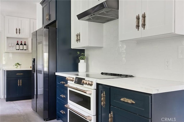 2982 Edgewick Rd, Glendale, CA 91206 - kitchen with under cabinet range hood, high end range, blue cabinetry, refrigerator with ice dispenser, and tasteful backsplash