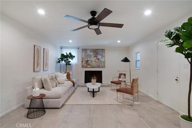 2982 Edgewick Rd, Glendale, CA 91206 - living room with ceiling fan, recessed lighting, light tile patterned floors, and a lit fireplace