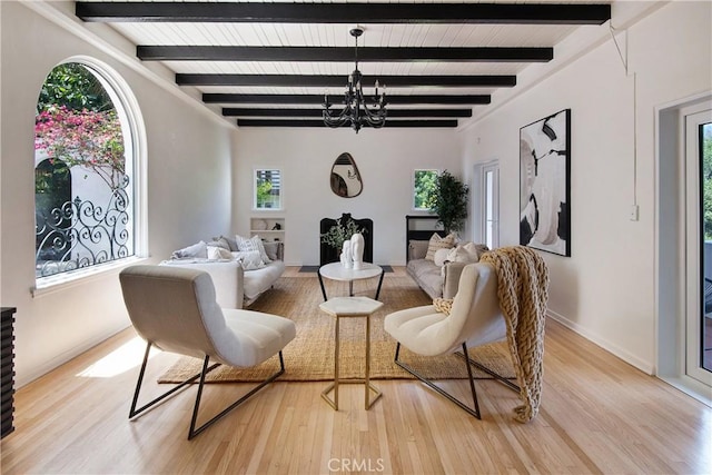 2982 Edgewick Rd, Glendale, CA 91206 - living area with light wood-style flooring, a chandelier, and beam ceiling