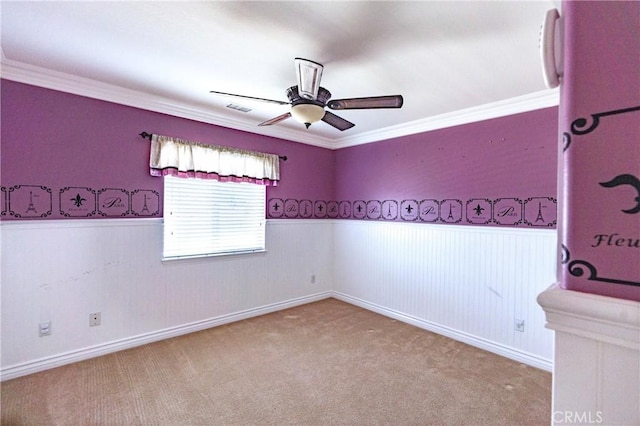 14145 Prairie Creek Pl, Eastvale, CA 92880 - spare room with a wainscoted wall, a ceiling fan, crown molding, and carpet