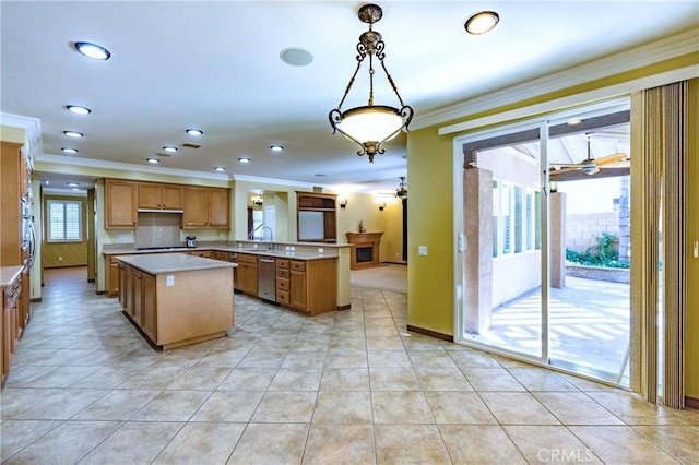 14145 Prairie Creek Pl, Eastvale, CA 92880 - kitchen with dishwasher, ornamental molding, brown cabinetry, light countertops, and a center island