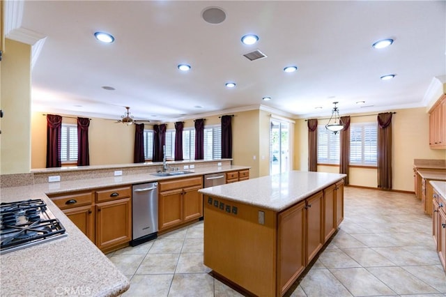 14145 Prairie Creek Pl, Eastvale, CA 92880 - kitchen featuring stainless steel gas stovetop, ornamental molding, a kitchen island, recessed lighting, and light tile patterned floors