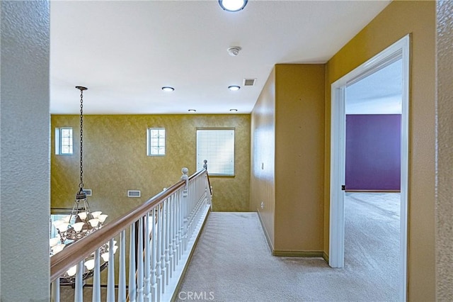 14145 Prairie Creek Pl, Eastvale, CA 92880 - hallway with carpet flooring, a chandelier, and recessed lighting
