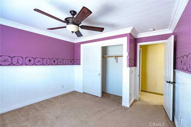14145 Prairie Creek Pl, Eastvale, CA 92880 - unfurnished bedroom with wainscoting, ornamental molding, a closet, carpet floors, and ceiling fan