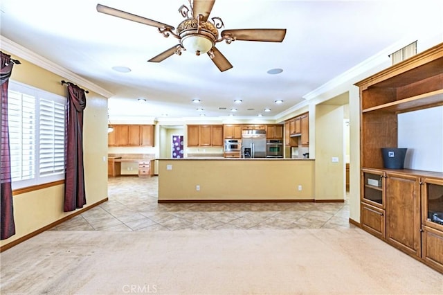 14145 Prairie Creek Pl, Eastvale, CA 92880 - kitchen with stainless steel appliances, crown molding, ceiling fan, a peninsula, and brown cabinets