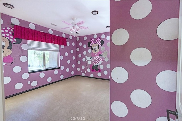14145 Prairie Creek Pl, Eastvale, CA 92880 - carpeted spare room with wallpapered walls and ceiling fan