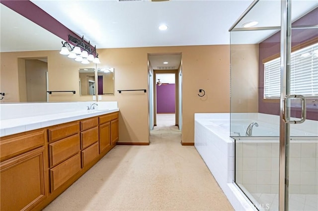 14145 Prairie Creek Pl, Eastvale, CA 92880 - bathroom with vanity, a bath, recessed lighting, and a shower with shower door