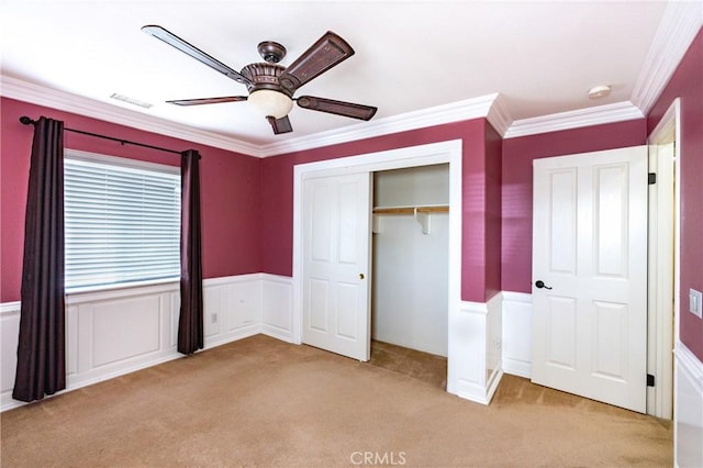 14145 Prairie Creek Pl, Eastvale, CA 92880 - unfurnished bedroom with light colored carpet, ornamental molding, a closet, and a ceiling fan