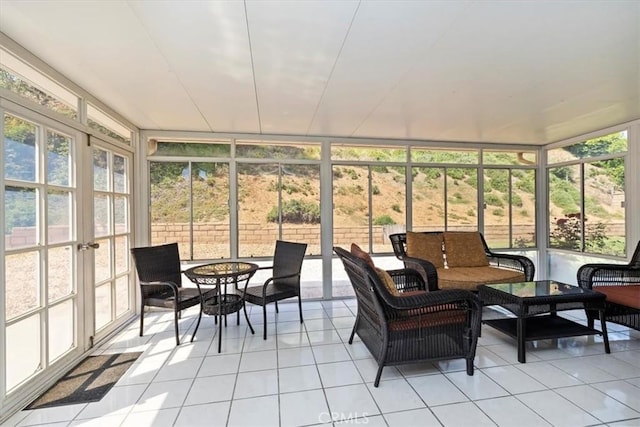 6807 Wilding Pl, Riverside, CA 92506 - sunroom featuring french doors and outdoor lounge area
