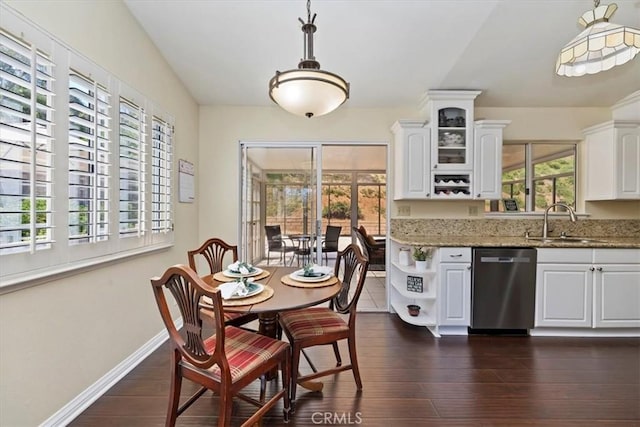 6807 Wilding Pl, Riverside, CA 92506 - dining room with dark wood-style flooring and baseboards