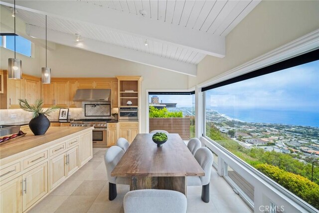 32131 Sea Island Dr, Dana Point, CA 92629 - dining area with light tile patterned flooring, a wood ceiling with exposed beams, and high vaulted ceiling