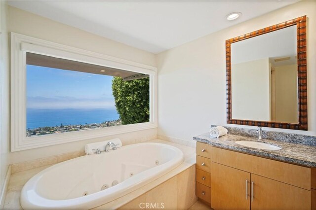 32131 Sea Island Dr, Dana Point, CA 92629 - bathroom with vanity, a tub with jets, and recessed lighting