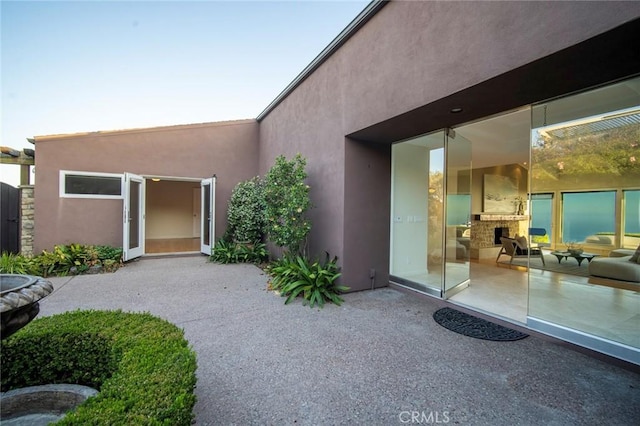 32131 Sea Island Dr, Dana Point, CA 92629 - doorway to property with stucco siding and a patio area