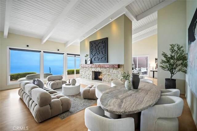 32131 Sea Island Dr, Dana Point, CA 92629 - living room featuring wood finished floors, a fireplace, high vaulted ceiling, and a wooden ceiling with exposed beams