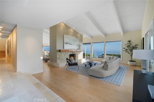 32131 Sea Island Dr, Dana Point, CA 92629 - living room with a stone fireplace, beam ceiling, and high vaulted ceiling