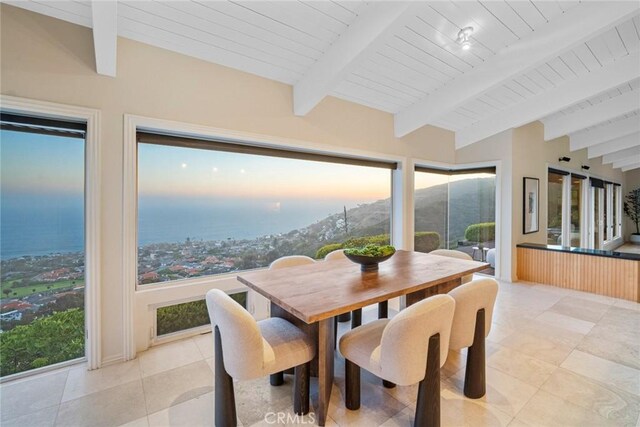 32131 Sea Island Dr, Dana Point, CA 92629 - dining area featuring light tile patterned floors, plenty of natural light, and a wood ceiling with exposed beams