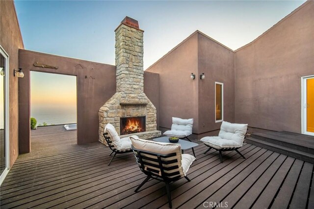 32131 Sea Island Dr, Dana Point, CA 92629 - wooden terrace with an outdoor stone fireplace