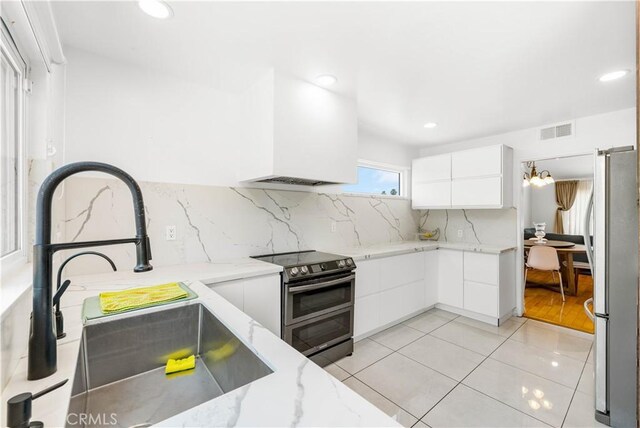 1707 Gay Park Way, Hacienda Heights, CA 91745 - kitchen with appliances with stainless steel finishes, light stone countertops, white cabinetry, modern cabinets, and recessed lighting