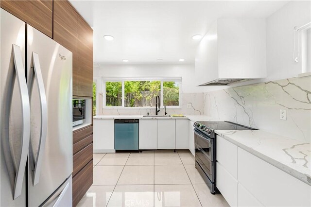 1707 Gay Park Way, Hacienda Heights, CA 91745 - kitchen with freestanding refrigerator, dishwasher, black electric range oven, white cabinetry, and decorative backsplash