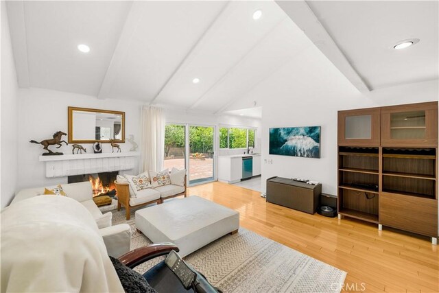 1707 Gay Park Way, Hacienda Heights, CA 91745 - living area with light wood-type flooring, a brick fireplace, and recessed lighting