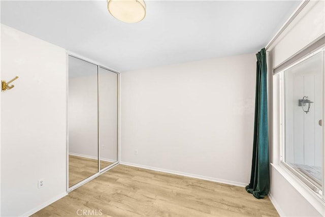 1707 Gay Park Way, Hacienda Heights, CA 91745 - unfurnished bedroom with light wood finished floors and a closet