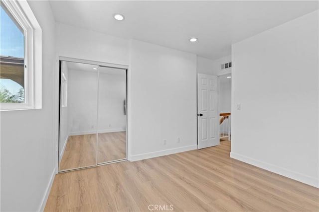 9019 Cedros Ave Unit 2, Panorama City, CA 91402 - unfurnished bedroom featuring light wood-style floors, recessed lighting, and a closet