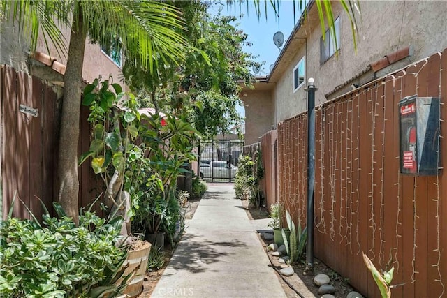 9019 Cedros Ave Unit 2, Panorama City, CA 91402 - view of side of property with stucco siding and a gate