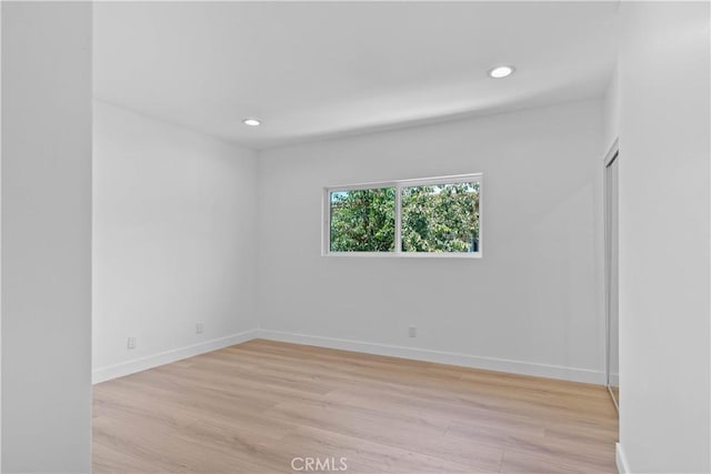 9019 Cedros Ave Unit 2, Panorama City, CA 91402 - unfurnished room featuring light wood finished floors and recessed lighting