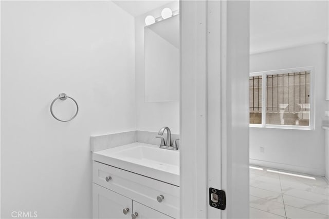 9019 Cedros Ave Unit 2, Panorama City, CA 91402 - bathroom with vanity and marble finish floors