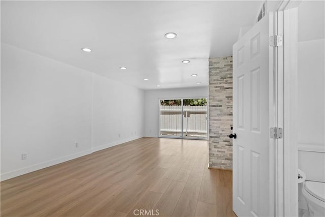 9019 Cedros Ave Unit 2, Panorama City, CA 91402 - unfurnished room featuring wood finished floors and recessed lighting