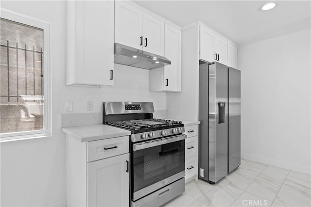 9019 Cedros Ave Unit 2, Panorama City, CA 91402 - kitchen with appliances with stainless steel finishes, under cabinet range hood, light countertops, white cabinets, and recessed lighting