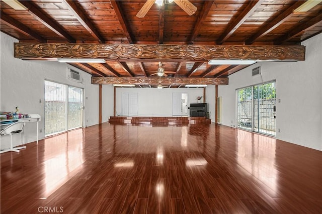 1067 N Wilton Pl, Los Angeles, CA 90038 - unfurnished living room with ceiling fan, a wooden ceiling with exposed beams, wood finished floors, and a wall unit AC