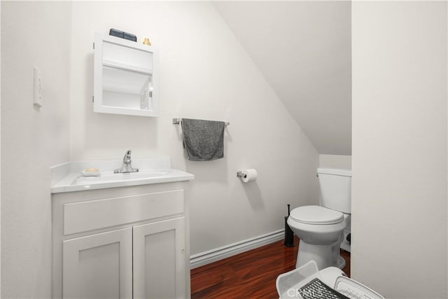 1067 N Wilton Pl, Los Angeles, CA 90038 - half bathroom with wood finished floors and vanity