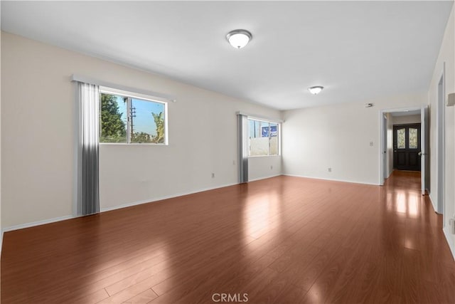 1067 N Wilton Pl, Los Angeles, CA 90038 - unfurnished room with wood finished floors