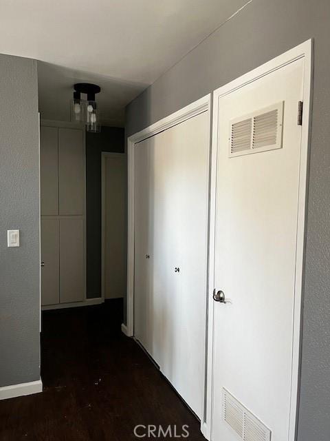 235 S 2nd St, Shandon, CA 93461 - corridor featuring baseboards