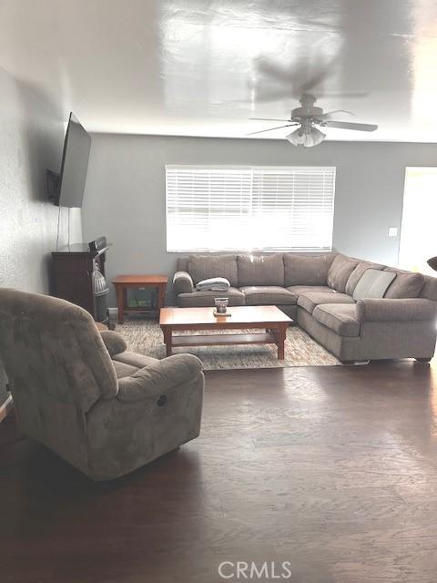 235 S 2nd St, Shandon, CA 93461 - living room with a ceiling fan and wood finished floors