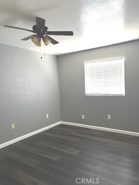 235 S 2nd St, Shandon, CA 93461 - empty room featuring a ceiling fan and wood finished floors