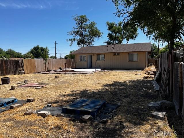 235 S 2nd St, Shandon, CA 93461 - rear view of property featuring a patio area and a fenced backyard