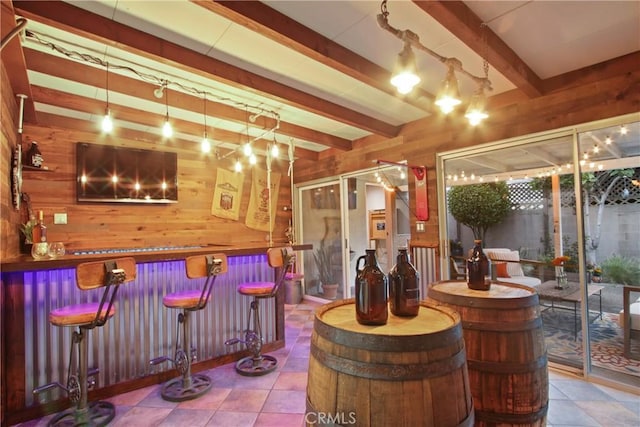 2283 Ximeno Ave, Long Beach, CA 90815 - community bar area with wooden walls, beamed ceiling, and tile patterned flooring