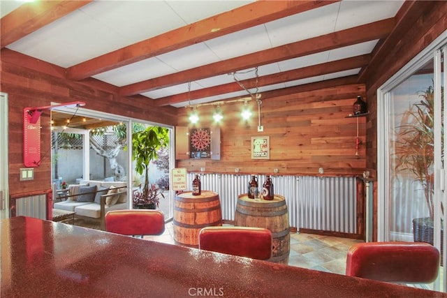 2283 Ximeno Ave, Long Beach, CA 90815 - living area featuring wood walls and beamed ceiling