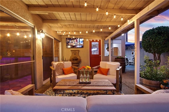2283 Ximeno Ave, Long Beach, CA 90815 - patio terrace at dusk with an outdoor hangout area and a patio area