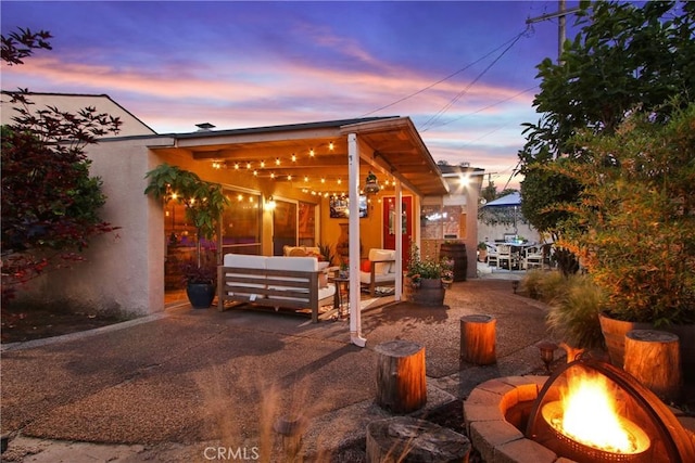 2283 Ximeno Ave, Long Beach, CA 90815 - view of patio / terrace featuring an outdoor living space with a fire pit