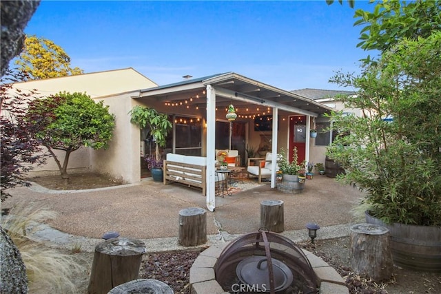 2283 Ximeno Ave, Long Beach, CA 90815 - view of patio featuring a fire pit