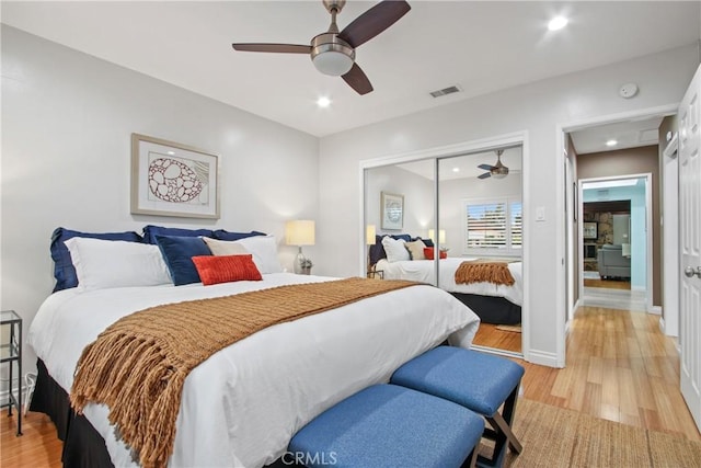 2283 Ximeno Ave, Long Beach, CA 90815 - bedroom with light wood-style flooring, recessed lighting, a closet, and ceiling fan
