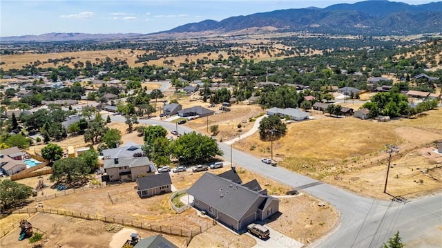 21509 Stage Dr, Tehachapi, CA 93561 - aerial perspective of suburban area with a mountainous background