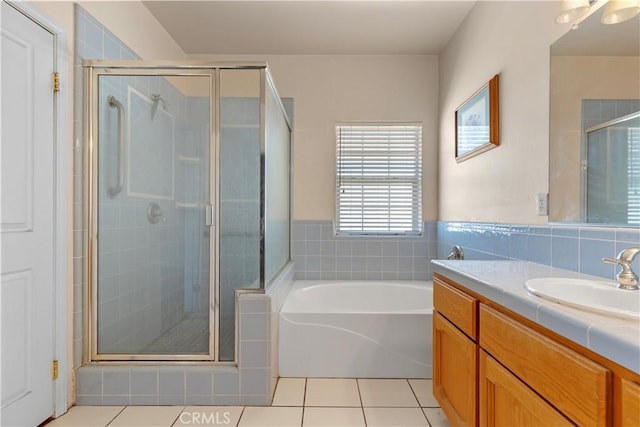 21509 Stage Dr, Tehachapi, CA 93561 - full bathroom with vanity, a stall shower, a bath, and tile patterned flooring