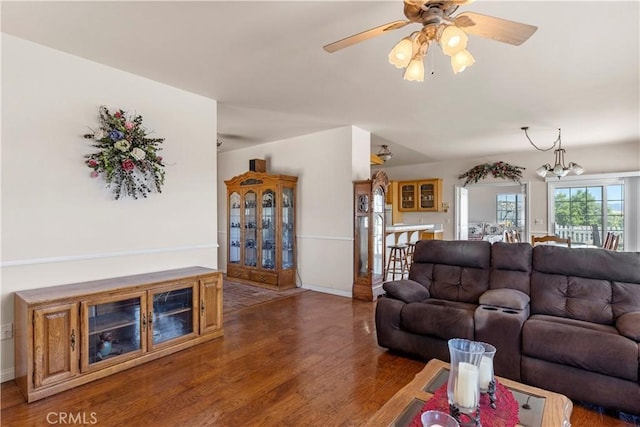 21509 Stage Dr, Tehachapi, CA 93561 - living room featuring wood finished floors, ceiling fan, and a chandelier